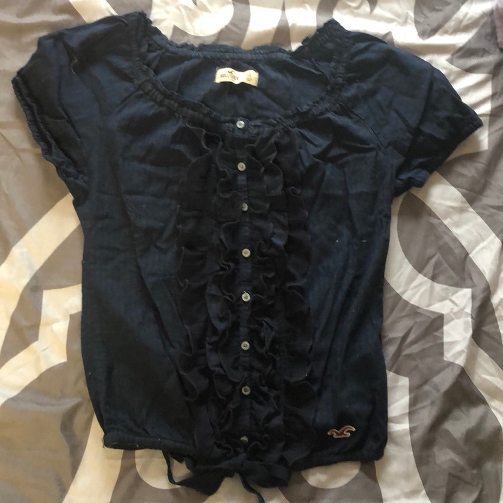 Navy blue Hollister shirt.